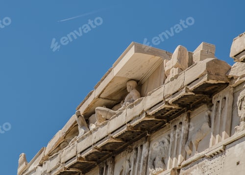 Preview: Ruins And Jets - Close Up Of The Roof Line Of The Parthenon At The Acropolis With Jet Trail In The