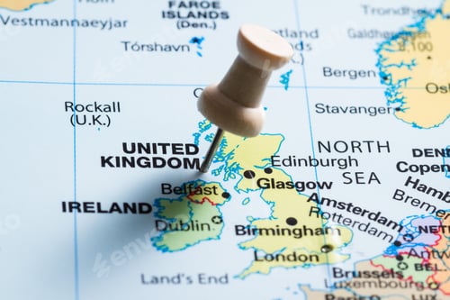 Preview: Close Up Of A World Map Focused On The Uk Marked With A Push Pin