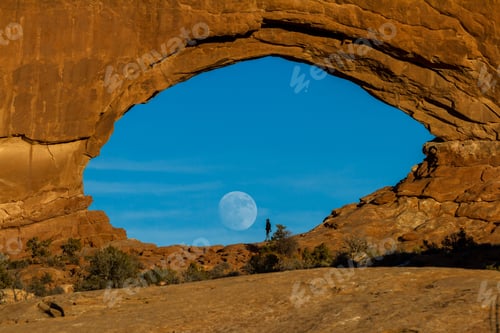 Preview: Beautiful View Of The Full Moon Rising Thru North Window In Arches National Park