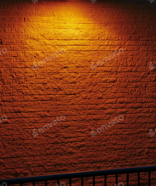 Preview: Wall Lit By A Single Light At Night