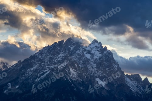 Preview: Mountains Under A Cloudy Sky