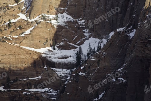 Preview: Landscape Of Weathered Stony Mountains With Snow And Dry Valley, From Southern Utah