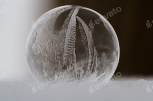 Preview: Close Up Of A Small Soap Bubble Freezing Rapidly Due To Extreme Cold Temperatures In Winter