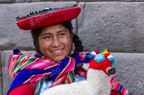 Preview: Cusco, Peru - May 14 : Jenni, A Young Woman Dressed In Colorful Traditional Native Peruvian Closing