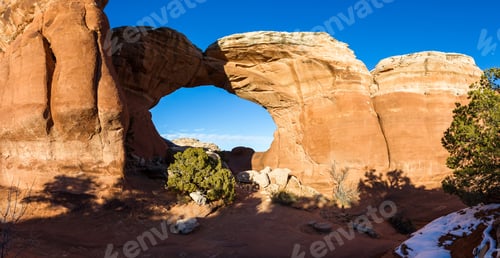 Preview: Feature Known As Broken Arch With Blue Sky In The Background