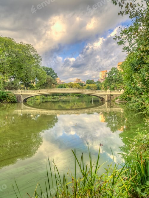 Preview: The Bow Bridge Is A Cast Iron Bridge Located In Central Park, New York City, Crossing Over The Lake