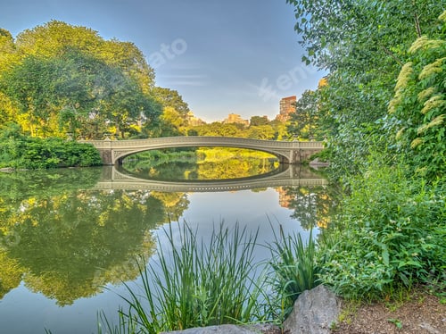 Preview: The Bow Bridge Is A Cast Iron Bridge Located In Central Park, New York City, Crossing Over The Lake
