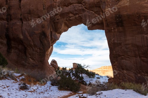 Preview: Red Rock Arch With An Irregular Ground Level Opening Found Near The Devils Garden Hiking Trail In
