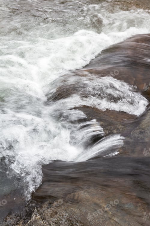Preview: Spring Water Flowing Over Rocks In To Lake Tahoe From The California Side