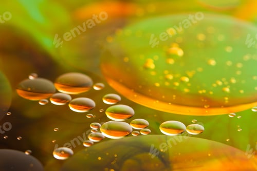 Preview: Abstract Background Using Food Coloring And Oil In A Glass Bowl With Water