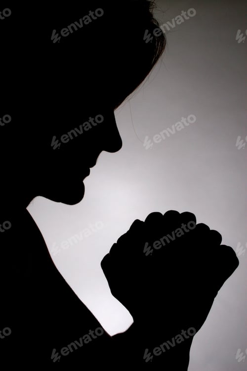 Preview: Silhouette Of Woman Praying With Hands Folded In Before Of Her