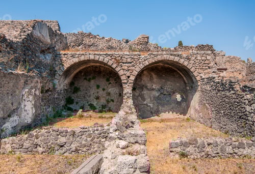 Preview: Ancient Ruins of Stone Arches against Blue Sky