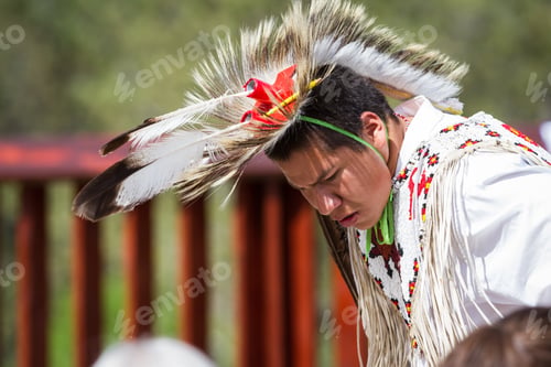 Preview: Crazy Horse Memorial, South Dakota - June 15 : Native American Performing For A Crowd In The Black