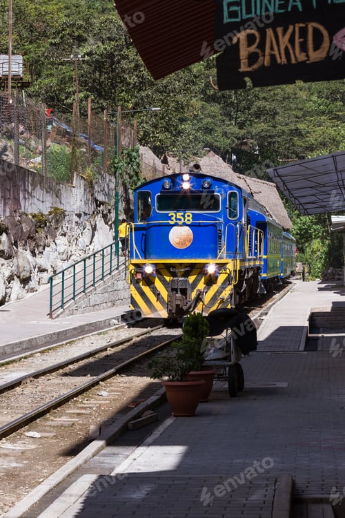 Preview: Machu Pichu, Peru - May 17 : Train Traveling Bringing Goods And Tourists To The City Of Aguas