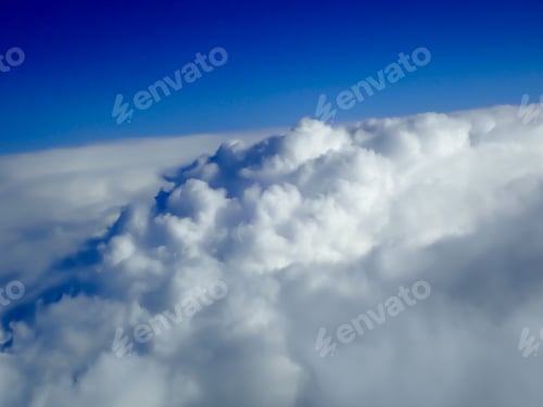 Billowing Clouds Against a Vivid Blue Sky