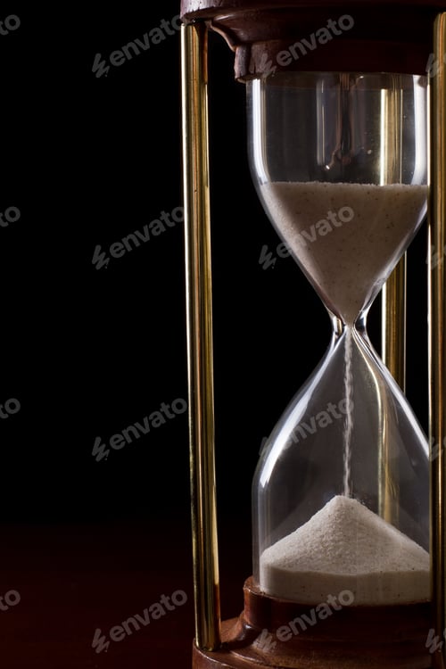 Preview: Hourglass On A Dark Setting, Concept Of Time Passing