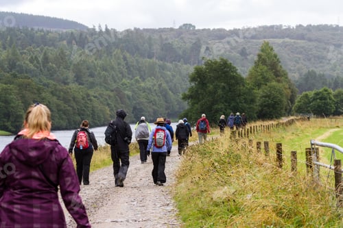 Preview: Scotland - September 09 2019: Group Of Walkers Exploring The Scottish Highlands In The Cairngorm