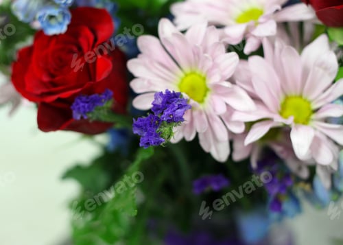 Preview: A Floral Bouquet Arrangement Of Classic Red Roses And Soft Pink Daisies And Blue Statice 8004
