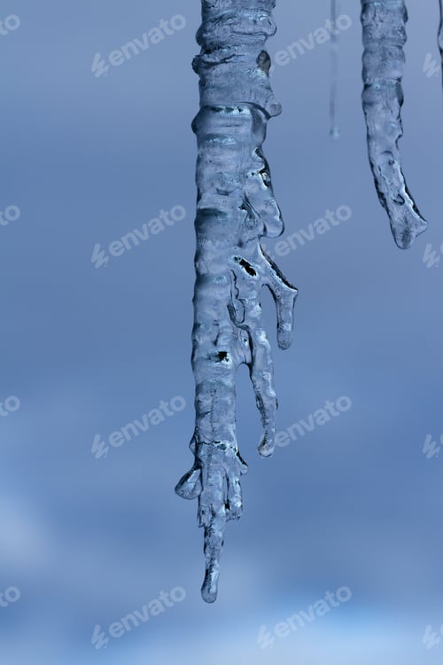 Preview: Icicles Suspended Over A Light Background With Interesting Shapes And Textures