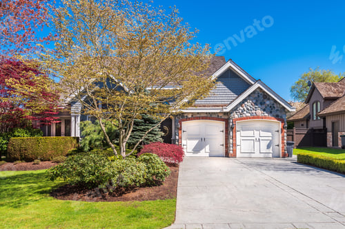 Preview: Beautiful Exterior Of Newly Built Luxury Home. Yard With Green Grass And Walkway Lead To Front