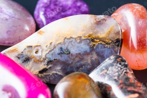 Preview: Close Up Of A Pile Of Polished Stones In Multiple Colors And Shapes