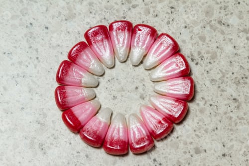 Preview: Pink Seasonal Candy Corns Arranged Into A Circle For Concept Or Background