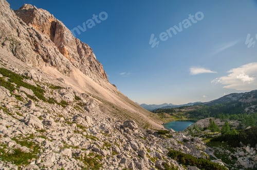 Preview: Landscape Photo Of The Views Atop A Rocky Mountain With Trees On A Sunny Day. Shot In Triglav