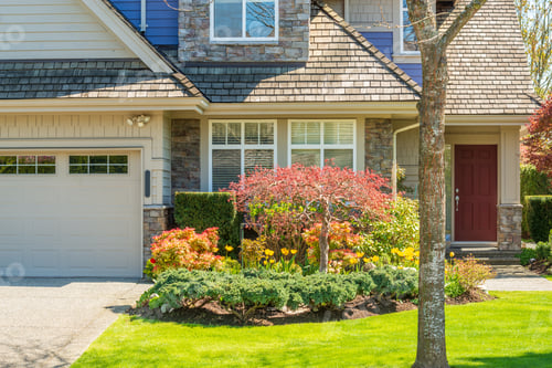 Preview: Fgrament Of Beautiful Exterior Of Newly Built Luxury Home. Yard With Green Grass And Landscape.