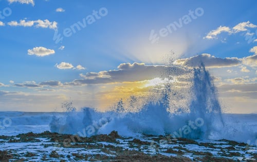 Preview: A Seascape Of Waves Splashing High In The Morning Sunlight On A Florida Bach