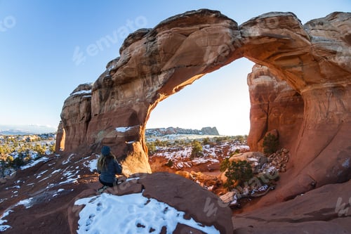 Preview: Woman Photographing Broken Arch With A Bit Of Snow Early December