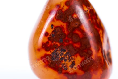 Preview: Close Up Of A Polished Piece Of Carnelian Isolated On A White Background