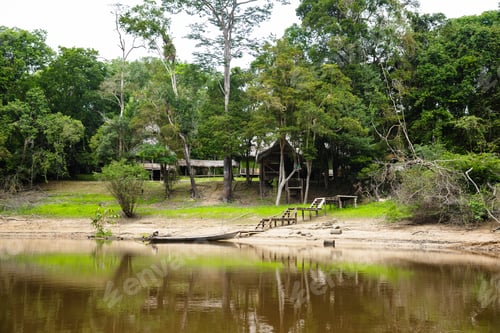 Preview: Image In Peruvian Jungle, Close To Amazon River. Traditional Wooden House. Calm Water, Trees, Wood.