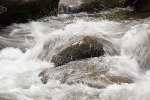 Preview: Cascading River Over And Around Rocks