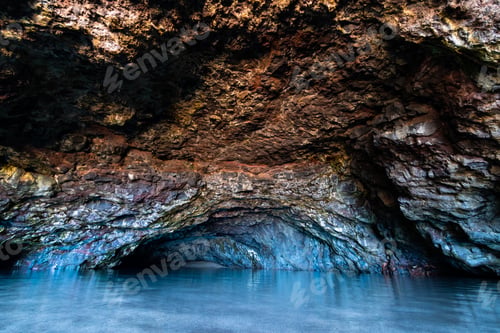 Preview: Large Cave With Clear Fresh Water Near Kalalau Beach In The Na Pali Coast State Park On The Island