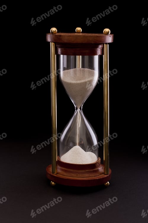 Preview: Hourglass On A Dark Setting, Concept Of Time Passing