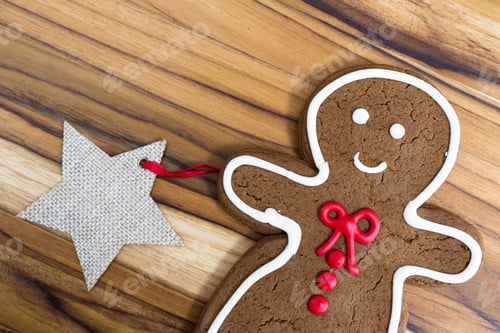 Preview: Holiday Classic, A Gingerbread Man Cookie On A Wooden Table