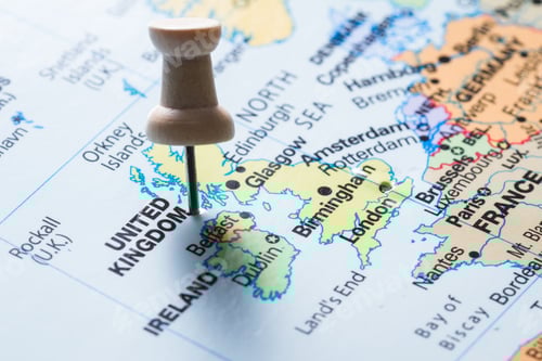 Preview: Close Up Of A World Map Focused On The Uk Marked With A Push Pin