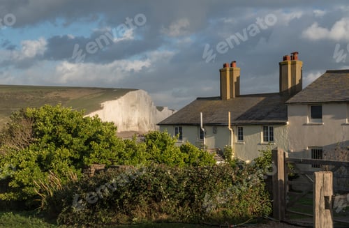 Preview: Old Coastguard Cottage On The Cliffs At Cuckmere Haven In East Sussex With Seven Sisters In The