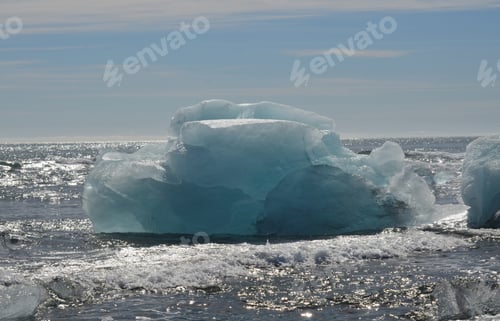 Preview: Icelandic Waters With A Large Iceberg In The Summer