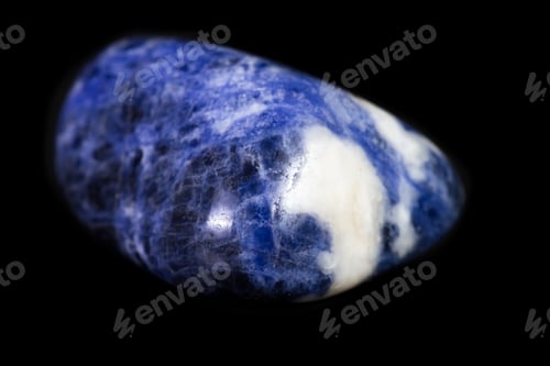 Preview: Polished Piece Of Sodalite Isolated On A Black Background