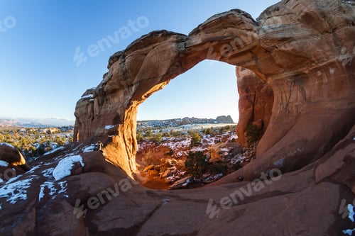 Preview: Feature Known As Broken Arch With Blue Sky In The Background