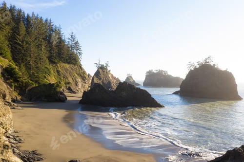 Preview: Beautiful Landscape Classic Of The Oregon Coast With Islets Topped With Evergreen Trees And A Light
