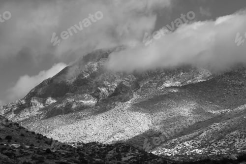 Preview: Snow And Cloud Capped Mountains In Black And White