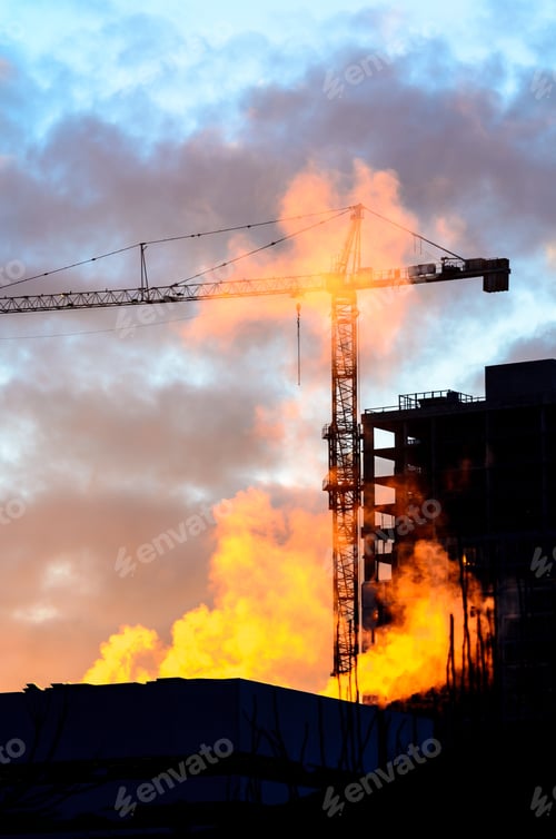 Preview: Construction Site With Cranes At Sunset, Sunrise, Dawn Time With The Cranes As A Silhouette