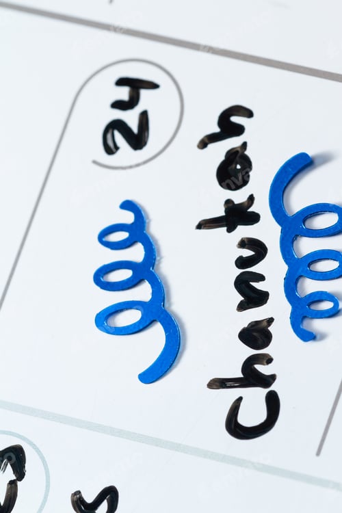 Preview: Close Up Of A Daily Planner Or Calendar With A Hand Written Message For A Celebration Or Holiday