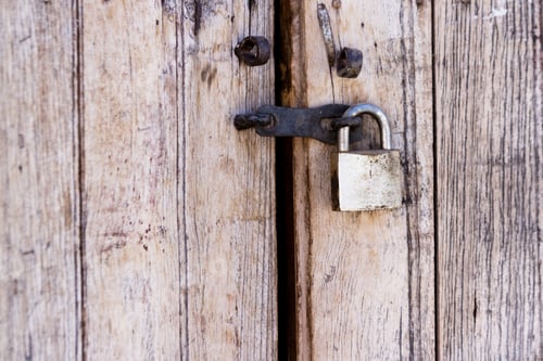 Preview: Close Up Of An Old Wooden Door With A Newer Lock