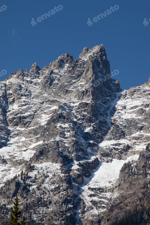 Preview: Snow On The Mountains With A Blue Sky