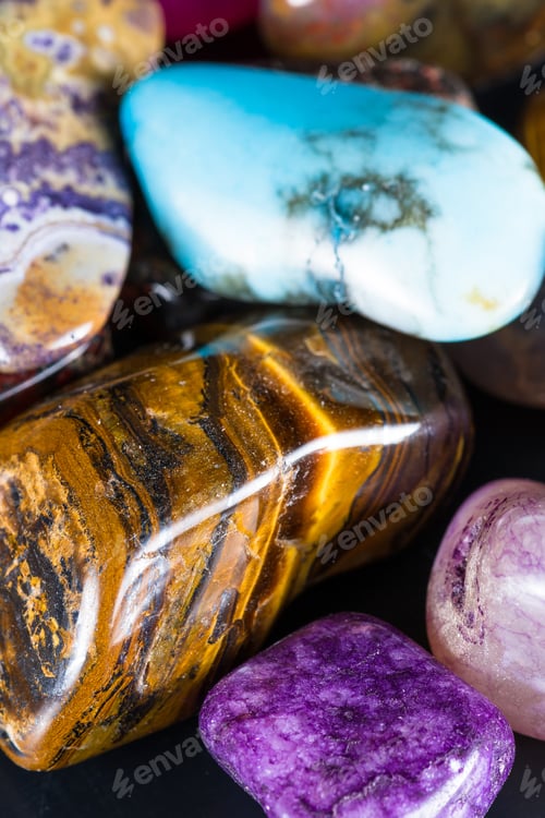 Preview: Close Up Of A Pile Of Polished Stones In Multiple Colors And Shapes