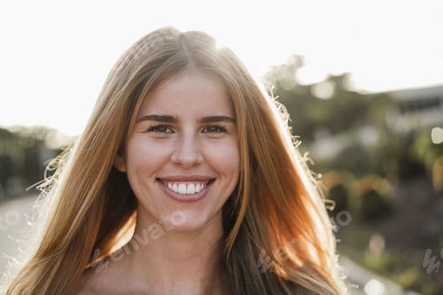 Preview: Young Girl Smiling On Camera Having Fun Outdoor In The City - Focus On Face