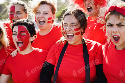 Preview: Red Sport Fans Screaming While Supporting Their Team - Football Supporters Having Fun At